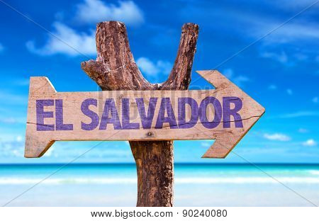 El Salvador wooden sign with beach background