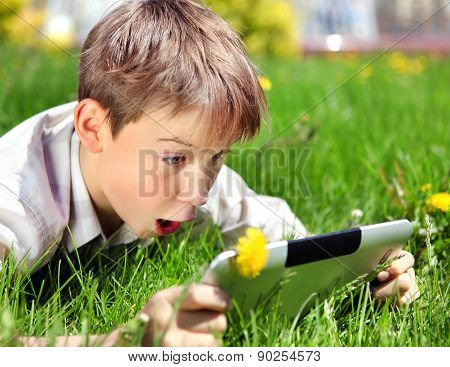Surprised Kid With Tablet
