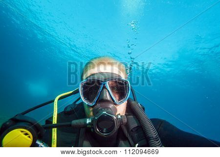 Diver, Showing Straight At Camera