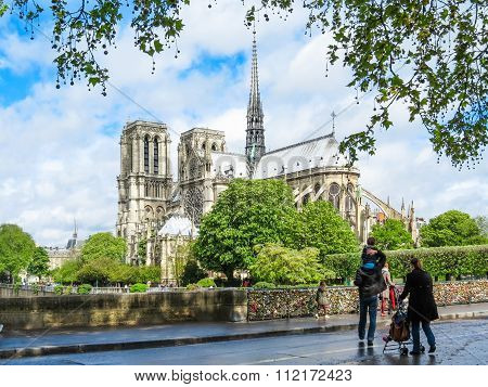 Family with children on walk across Paris