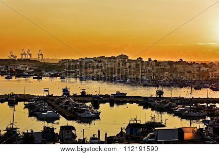 MARSAXLOKK, MALTA - SEP 6: native fishing boats in the ancient fishing village Marsaxlokk in Mediter