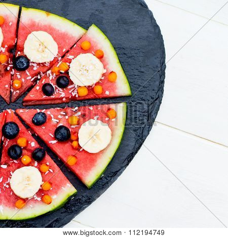 Vegan Snack From Watermelon, Fruits And Berries - Blueberries, Shredded Coconut, Bananas,  Seabuckth