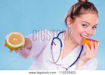 Happy Dietitian Nutritionist With Grapefruit.