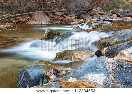 Water Flowing Through The Virgin River In Zion National Park In Usa