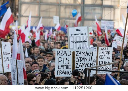 CRACOW POLAND - DECEMBER 19 2015: Cracow Main Square - The demonstration of the Committee of the Protection of Democracy / KOD/ against the break of law through the government PIS in Poland.