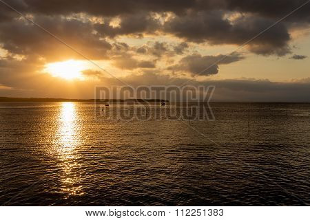 Nusa Penida, Bali Beach With Dramatic Sky And Sunset