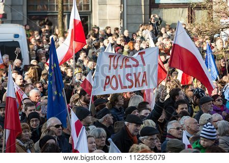 CRACOW POLAND - DECEMBER 19 2015: Cracow Main Square - The demonstration of the Committee of the Protection of Democracy / KOD/ against the break of law through the government PIS in Poland.