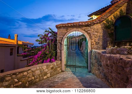 Old style stone gate at midnight