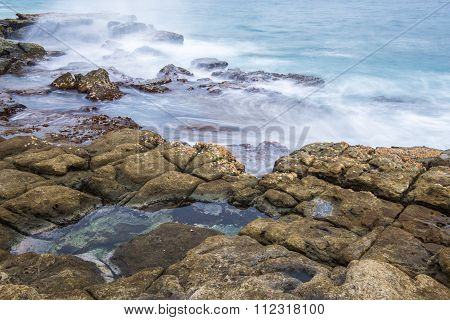 Rocks and waves at Point Cartwright