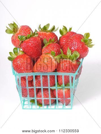 Punnet or basket of fresh strawberries on a white background