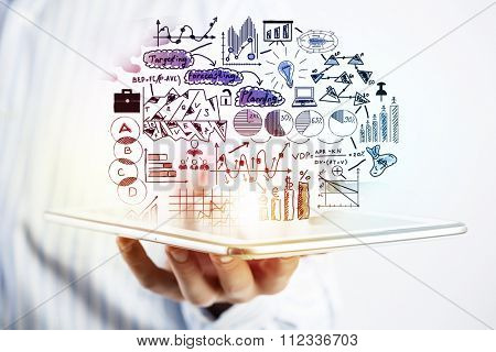 Businessman hands demostrating business strategy plan on tablet screen