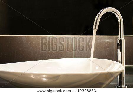 Water On Faucet
