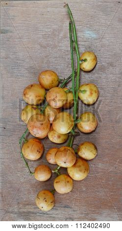rambi tropical fruit on wooden board