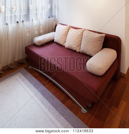 guest room of a modern apartment, divan bed