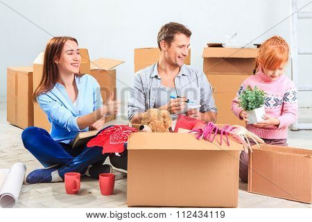 The happy family  at repair and relocation