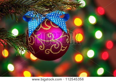 Decorated Christmas tree on blurred, sparkling and fairy background