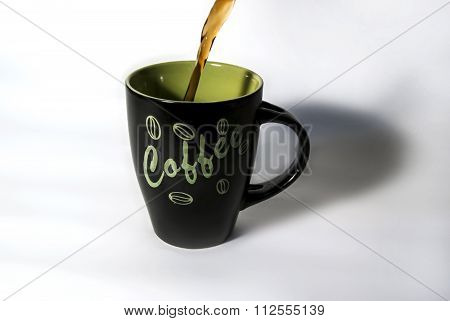 Cup Of Coffee Being Filled