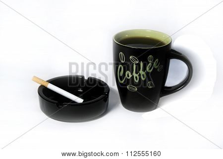 Cup Of Coffee And Black Ashtray