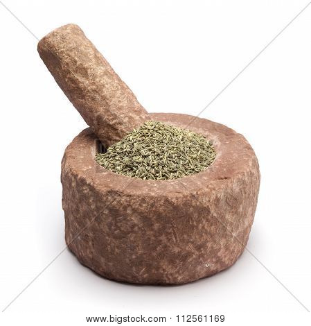 Organic Aniseed in mortar.