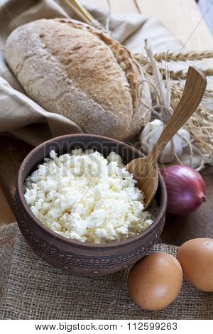 Rustic natural dairy products cottage cheese and bread