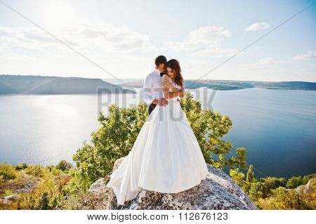 Very Sensual And Gorgeus Wedding Couple On The Picturesque Landscapes