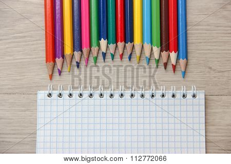 A set of colored pencils.