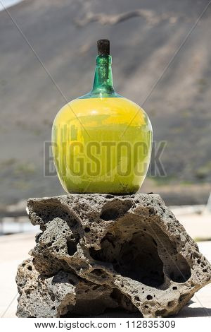 big bottles with grape wine - malvasia. Lanzarote Spain