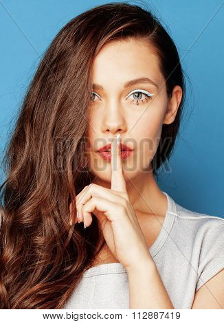 young pretty adorable woman with candy close up like doll