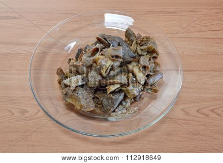 fried pork entrails with garlic on dish