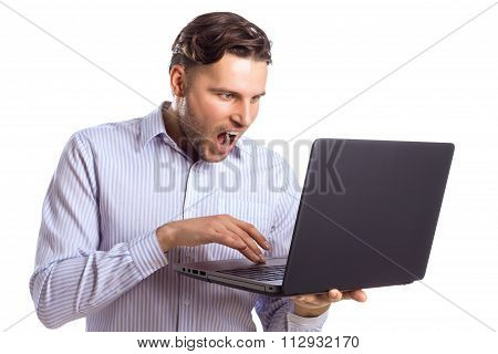 Handsome Surprised Businessman Skreaming At Laptop