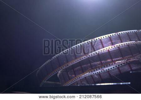 Old Film With A Movie On A Dark Background