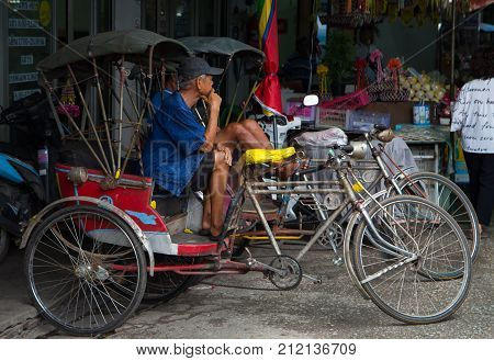 Lamphun Thailand - October 27 2017: Rickshaw parking in front of market waiting for customer