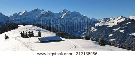 Snow covered mountains Schlauchhorn Oldenhorn and Vorder Walig Swiss Alps.