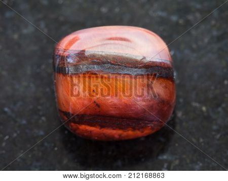 Polished Jaspilite Gem Stone On Dark Background
