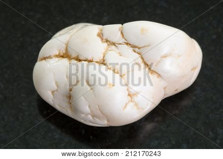 Polished Magnesite Stone On Dark Background