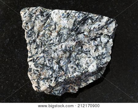 Rough Lujavrite Stone On Dark Background