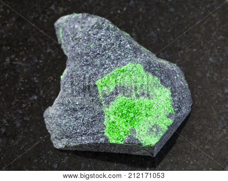 Uvarovite Crystals On Rough Rock On Dark