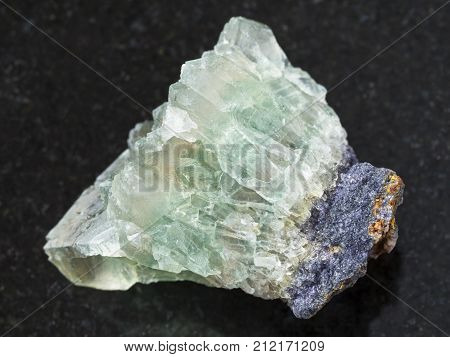 Raw Crystalline Fluorite Gemstone On Dark