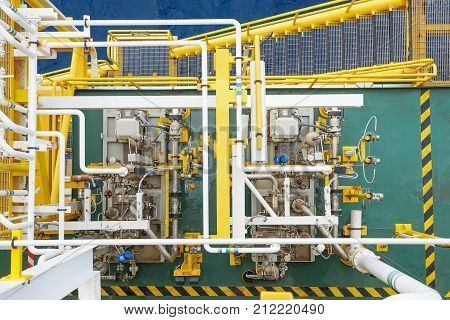 Top view of centrifugal type of pump and seal system accessories at offshore oil and gas industy Pumps drive by electric motor.