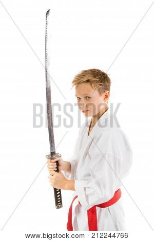 Pre-teen boy with a samurai sword isolated on a white background