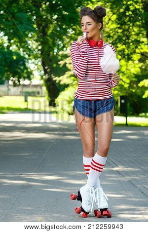 Happy Woman On The Roller-skate In The Park