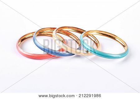 Four fashion color bracelets. Set of female modern bracelets isolated on white background. Woman fashion accessories.