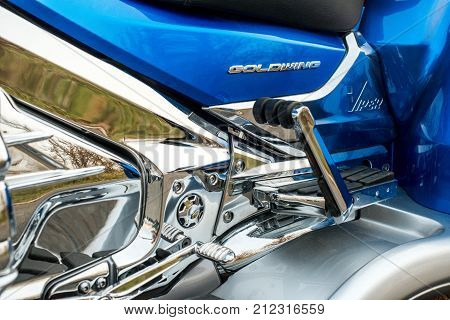 KHABAROVSK, RUSSIA - May 3, 2017: Honda Trake three-wheeled motorbike hand-assembled stands on flat ground in the street on Khabarovsk on may 3, 2017