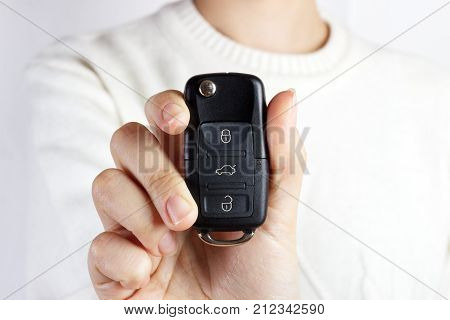 Car Keys. Seller hand giving keys. girl with car keys.
