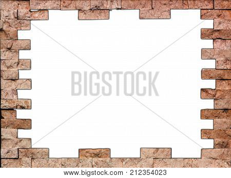 The wall of natural stone, grunge frame, white background close-up