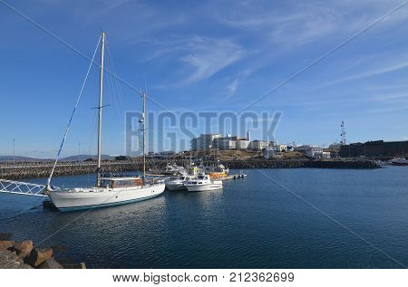 Stykkisholmur Iceland with boats anchored in the harbor.