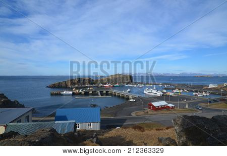 Breathtaking view of the basalt island known as Sugandisey Lookout in Iceland.