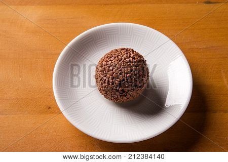 Traditional Brazilian Sweets - Brigadeiros - Over Wood Background.