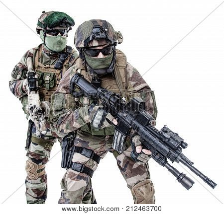 Paratroopers of french 1st Marine Infantry Parachute Regiment RPIMA studio shot firing pointing weapons