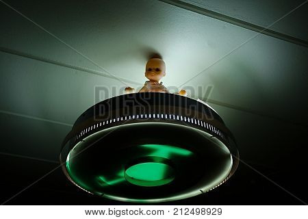 Spooky ceiling light wit doll